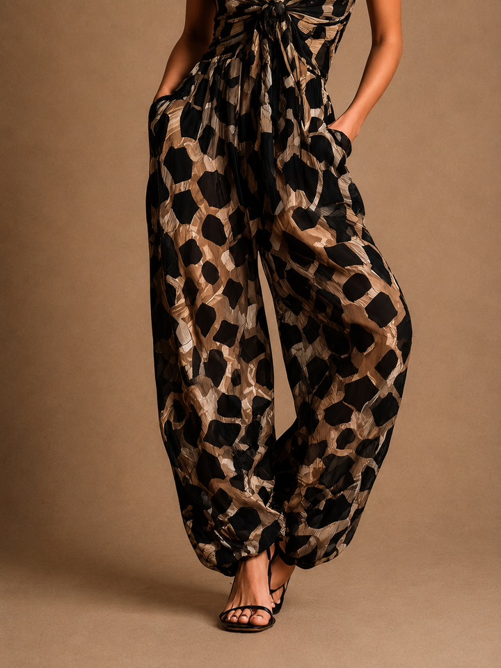 Carla - tuta mono halter selvaggia a caduta fluida