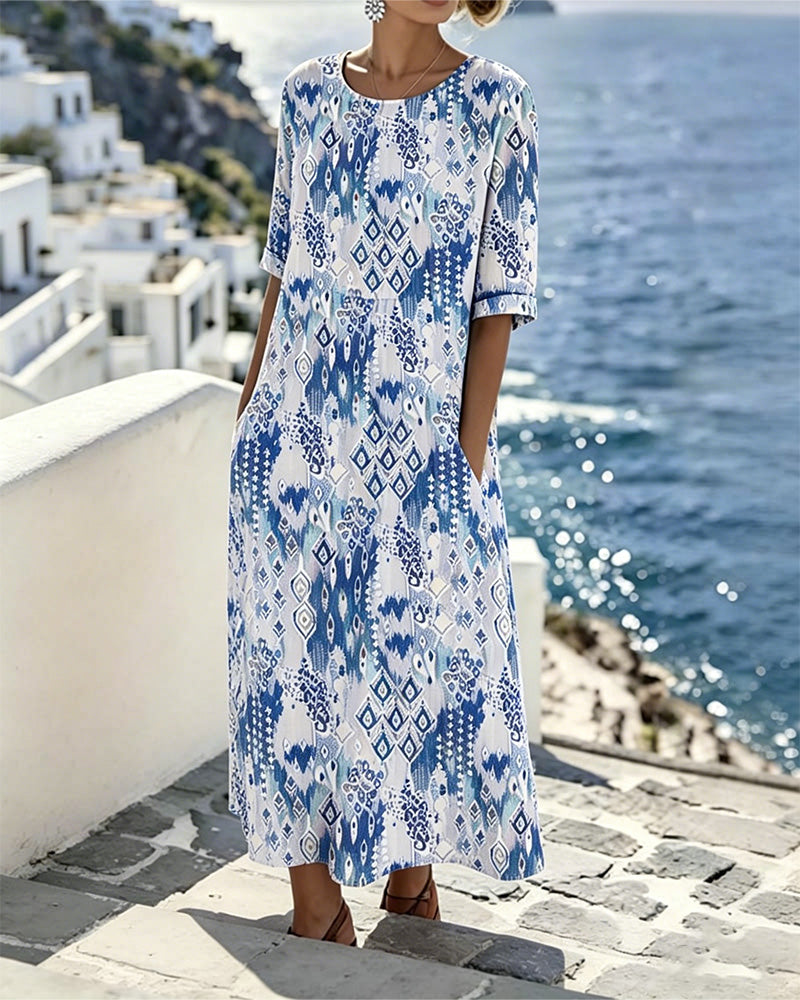 Emma | Vestito midi floreale leggero e fluido