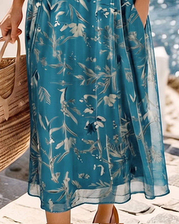 María | Abito midi floreale leggero e fluido