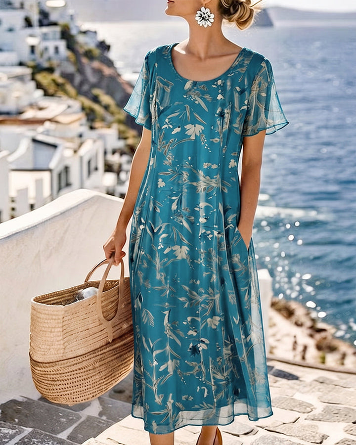 María | Abito midi floreale leggero e fluido